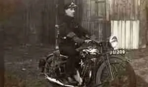 postal worker on a motorbike