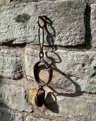 Shackles, known as Jougs, at the Abernethy Round Tower