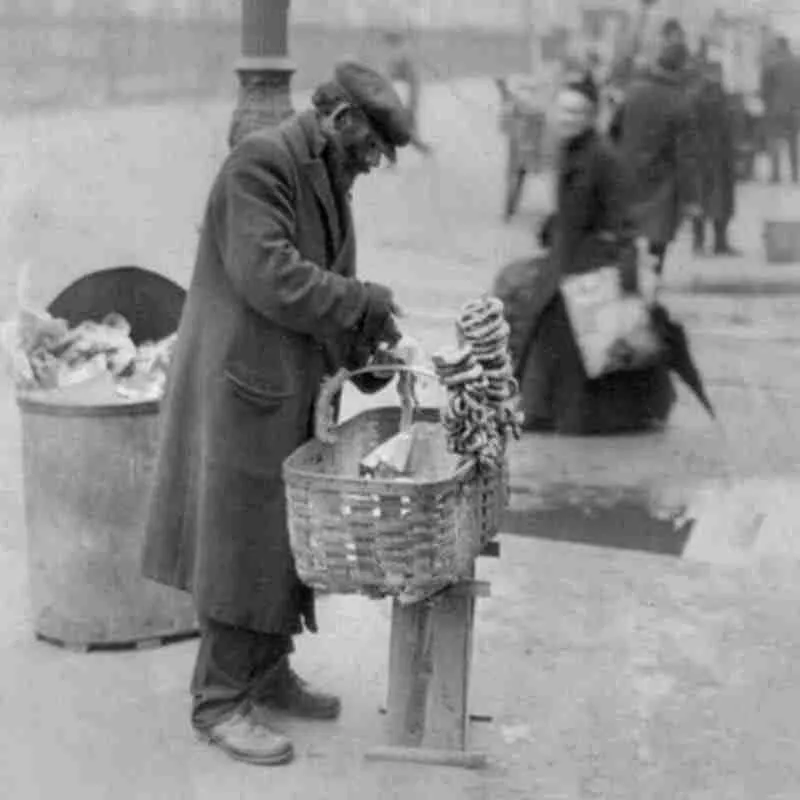 A hawker selling his goods on the street.