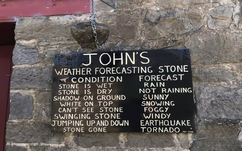 Depicting the Johnston surname, John's stone predicts the weather.